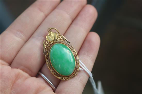 A Chinese gold framed jade pendant, in a Tessier box